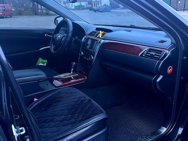 Чорний Тойота Камрі, об'ємом двигуна 2.5 л та пробігом 170 тис. км за 15300 $, фото 5 на Automoto.ua