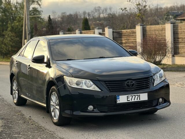 Черный Тойота Камри, объемом двигателя 2.5 л и пробегом 235 тыс. км за 10200 $, фото 1 на Automoto.ua