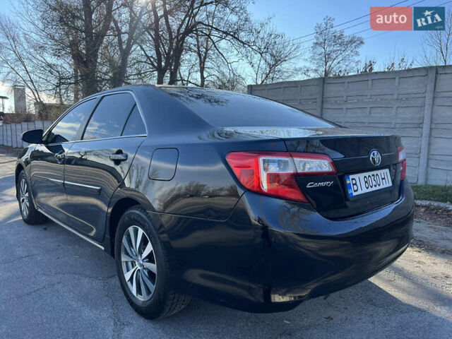 Чорний Тойота Камрі, об'ємом двигуна 2.5 л та пробігом 155 тис. км за 12000 $, фото 3 на Automoto.ua