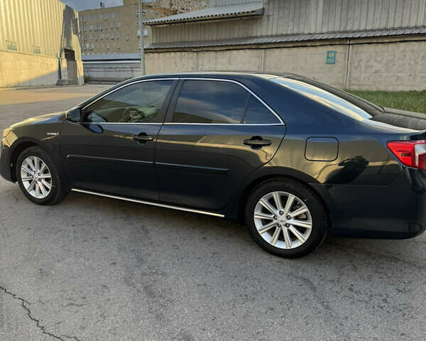 Черный Тойота Камри, объемом двигателя 2.5 л и пробегом 185 тыс. км за 12800 $, фото 7 на Automoto.ua