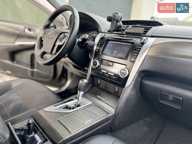 Черный Тойота Камри, объемом двигателя 2.5 л и пробегом 255 тыс. км за 13500 $, фото 31 на Automoto.ua
