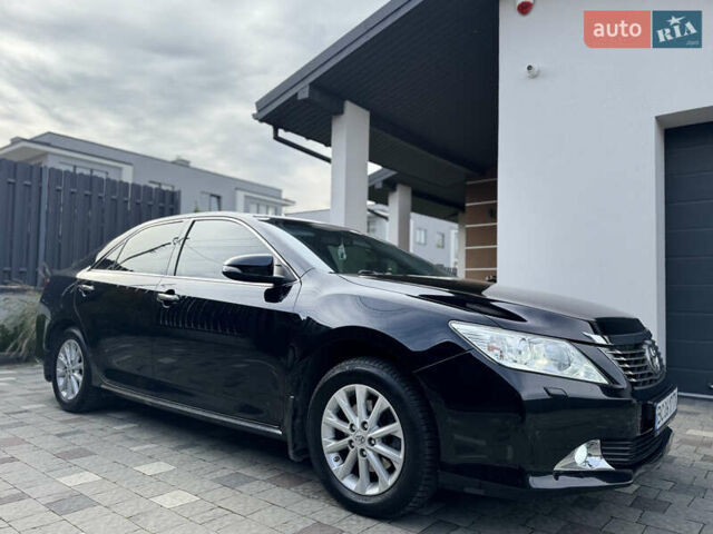 Черный Тойота Камри, объемом двигателя 2.5 л и пробегом 255 тыс. км за 13500 $, фото 15 на Automoto.ua