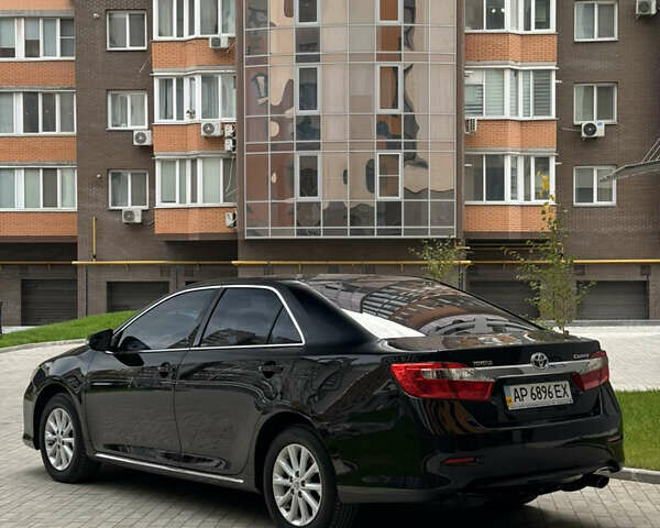 Черный Тойота Камри, объемом двигателя 2.5 л и пробегом 142 тыс. км за 13400 $, фото 5 на Automoto.ua