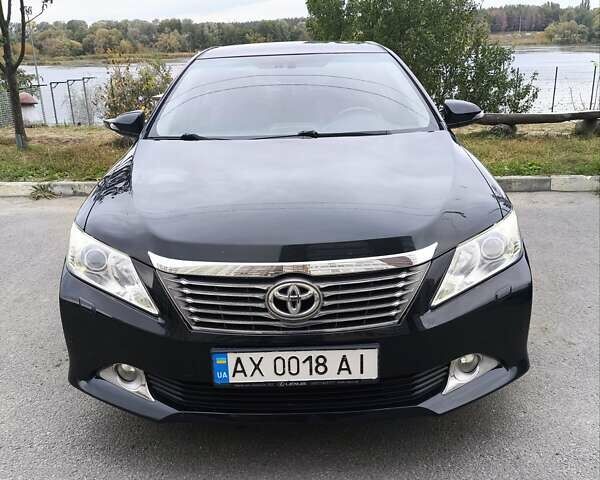 Черный Тойота Камри, объемом двигателя 2.5 л и пробегом 205 тыс. км за 14300 $, фото 6 на Automoto.ua