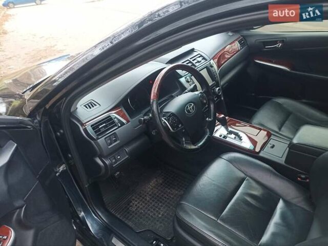 Черный Тойота Камри, объемом двигателя 2.5 л и пробегом 185 тыс. км за 13200 $, фото 2 на Automoto.ua