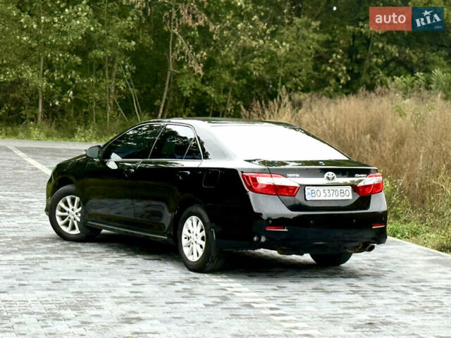 Черный Тойота Камри, объемом двигателя 2.5 л и пробегом 260 тыс. км за 10999 $, фото 23 на Automoto.ua