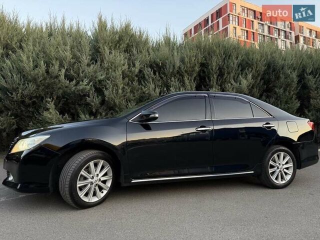 Черный Тойота Камри, объемом двигателя 2.49 л и пробегом 186 тыс. км за 13700 $, фото 3 на Automoto.ua