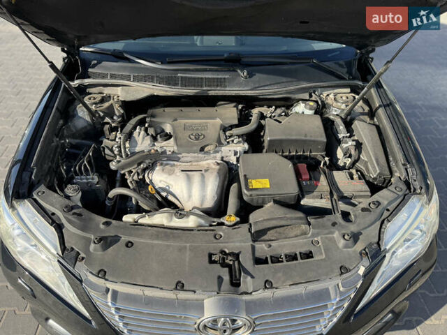 Чорний Тойота Камрі, об'ємом двигуна 2.49 л та пробігом 305 тис. км за 11800 $, фото 23 на Automoto.ua