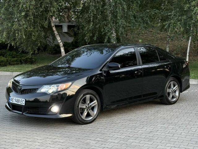 Черный Тойота Камри, объемом двигателя 2.5 л и пробегом 198 тыс. км за 10900 $, фото 2 на Automoto.ua