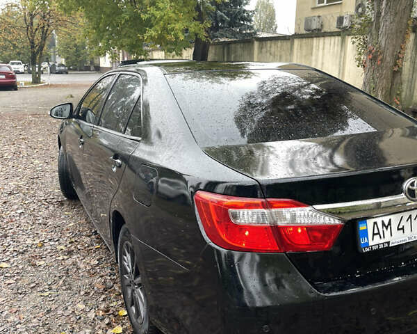 Черный Тойота Камри, объемом двигателя 2.36 л и пробегом 230 тыс. км за 10250 $, фото 9 на Automoto.ua