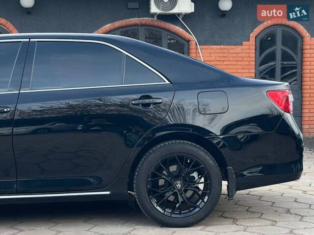 Черный Тойота Камри, объемом двигателя 2.49 л и пробегом 216 тыс. км за 13999 $, фото 4 на Automoto.ua