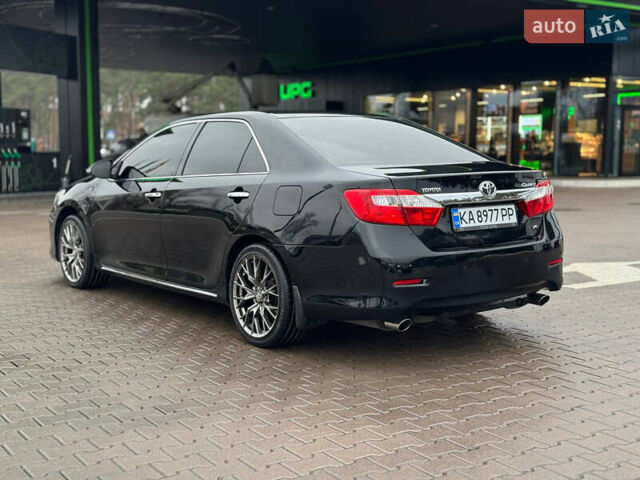 Черный Тойота Камри, объемом двигателя 3.46 л и пробегом 193 тыс. км за 14900 $, фото 23 на Automoto.ua
