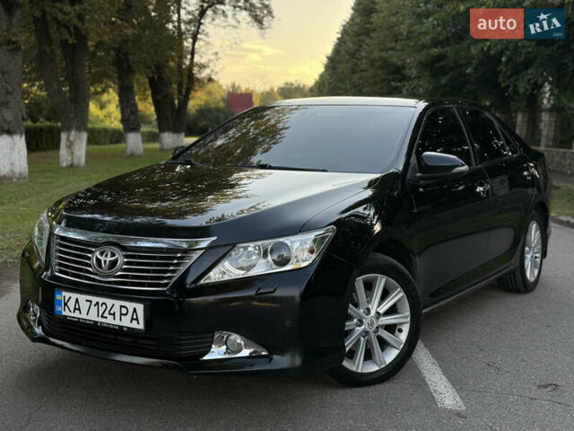 Черный Тойота Камри, объемом двигателя 2.5 л и пробегом 136 тыс. км за 14300 $, фото 1 на Automoto.ua