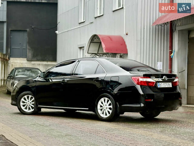 Чорний Тойота Камрі, об'ємом двигуна 2.5 л та пробігом 251 тис. км за 10999 $, фото 32 на Automoto.ua