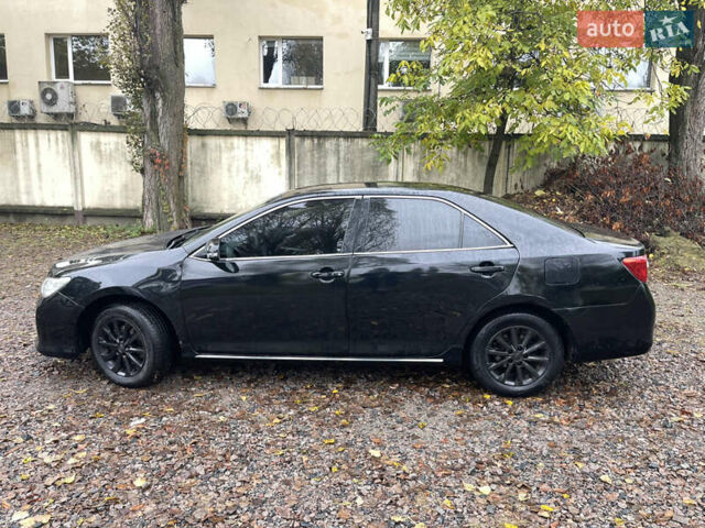 Черный Тойота Камри, объемом двигателя 2.36 л и пробегом 230 тыс. км за 10250 $, фото 7 на Automoto.ua