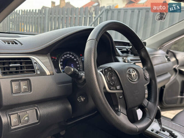 Черный Тойота Камри, объемом двигателя 2.5 л и пробегом 255 тыс. км за 13500 $, фото 49 на Automoto.ua