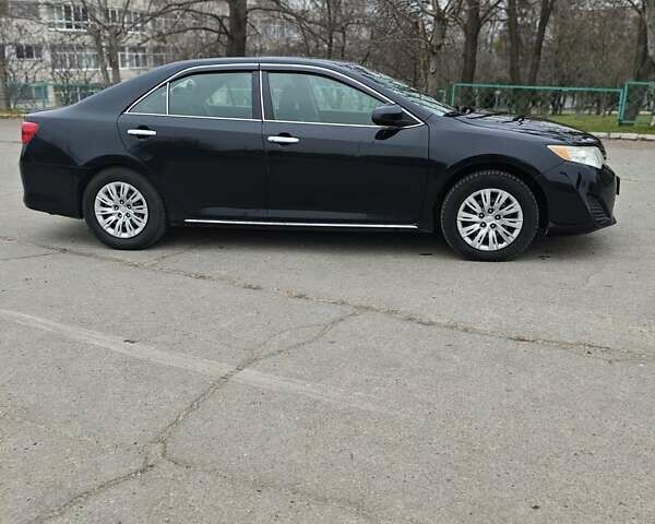 Чорний Тойота Камрі, об'ємом двигуна 2.5 л та пробігом 189 тис. км за 11500 $, фото 4 на Automoto.ua