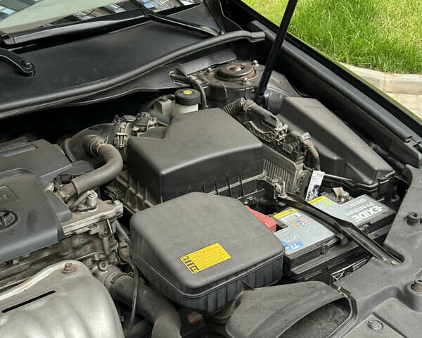 Черный Тойота Камри, объемом двигателя 2.5 л и пробегом 142 тыс. км за 13400 $, фото 15 на Automoto.ua