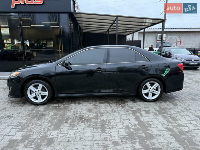 Черный Тойота Камри, объемом двигателя 2.49 л и пробегом 230 тыс. км за 13200 $, фото 1 на Automoto.ua
