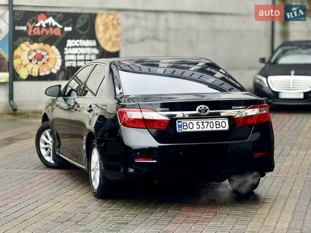 Чорний Тойота Камрі, об'ємом двигуна 2.5 л та пробігом 251 тис. км за 10999 $, фото 33 на Automoto.ua