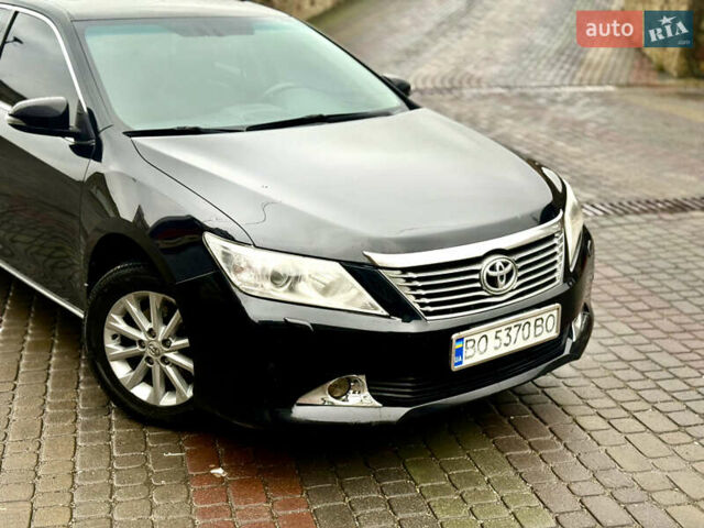 Чорний Тойота Камрі, об'ємом двигуна 2.5 л та пробігом 251 тис. км за 10999 $, фото 11 на Automoto.ua