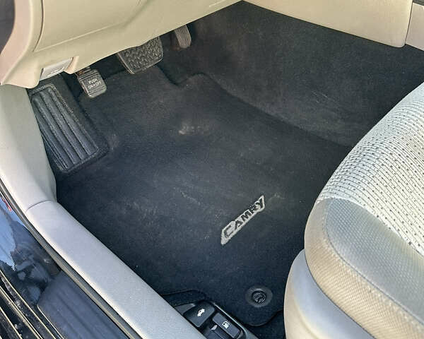 Черный Тойота Камри, объемом двигателя 2.49 л и пробегом 142 тыс. км за 11500 $, фото 2 на Automoto.ua