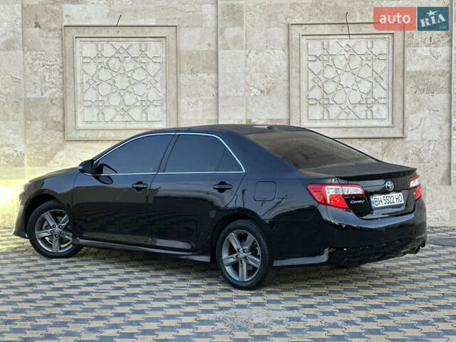 Черный Тойота Камри, объемом двигателя 2.5 л и пробегом 215 тыс. км за 11950 $, фото 17 на Automoto.ua