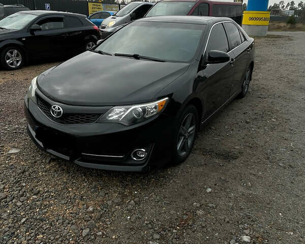 Черный Тойота Камри, объемом двигателя 2.5 л и пробегом 252 тыс. км за 10500 $, фото 9 на Automoto.ua