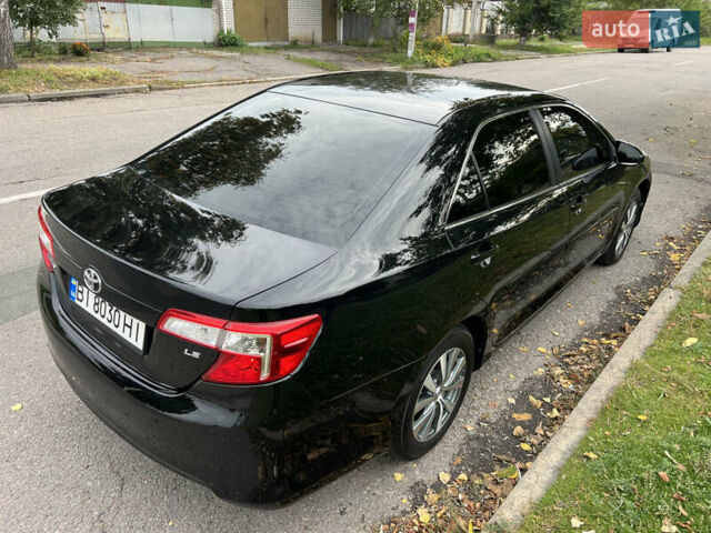 Чорний Тойота Камрі, об'ємом двигуна 2.5 л та пробігом 152 тис. км за 12700 $, фото 4 на Automoto.ua