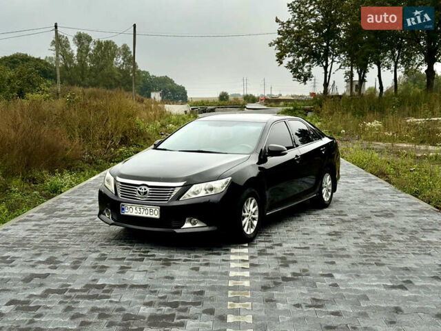 Черный Тойота Камри, объемом двигателя 2.5 л и пробегом 260 тыс. км за 10999 $, фото 13 на Automoto.ua
