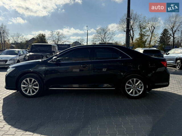 Чорний Тойота Камрі, об'ємом двигуна 2.49 л та пробігом 305 тис. км за 11800 $, фото 7 на Automoto.ua