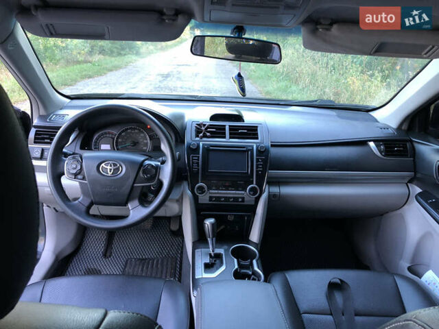 Черный Тойота Камри, объемом двигателя 2.49 л и пробегом 250 тыс. км за 10500 $, фото 10 на Automoto.ua