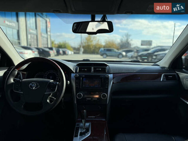Чорний Тойота Камрі, об'ємом двигуна 2.49 л та пробігом 305 тис. км за 11800 $, фото 9 на Automoto.ua