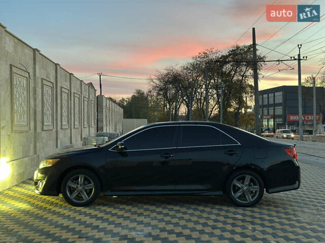 Черный Тойота Камри, объемом двигателя 2.5 л и пробегом 215 тыс. км за 11950 $, фото 15 на Automoto.ua