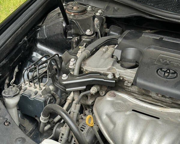 Черный Тойота Камри, объемом двигателя 2.5 л и пробегом 142 тыс. км за 13400 $, фото 14 на Automoto.ua