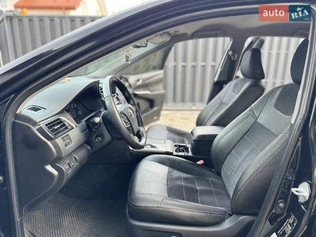 Черный Тойота Камри, объемом двигателя 2.5 л и пробегом 255 тыс. км за 13500 $, фото 17 на Automoto.ua