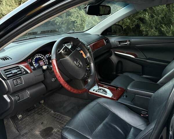 Черный Тойота Камри, объемом двигателя 2.49 л и пробегом 186 тыс. км за 13700 $, фото 11 на Automoto.ua