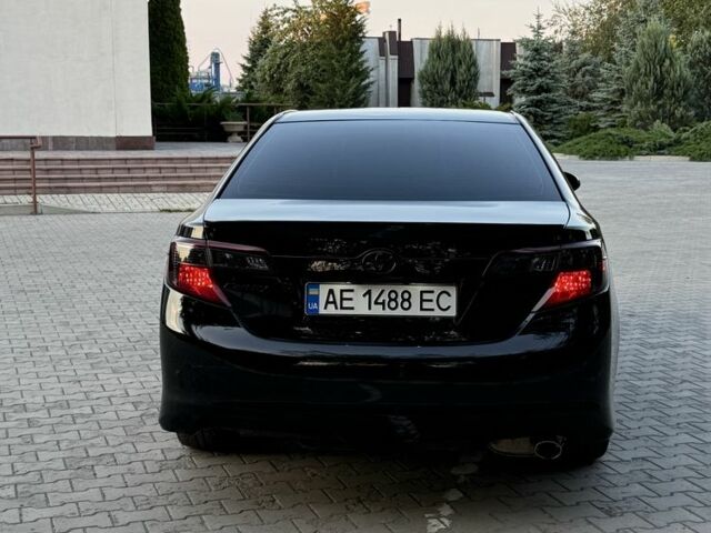 Черный Тойота Камри, объемом двигателя 2.5 л и пробегом 198 тыс. км за 10900 $, фото 6 на Automoto.ua