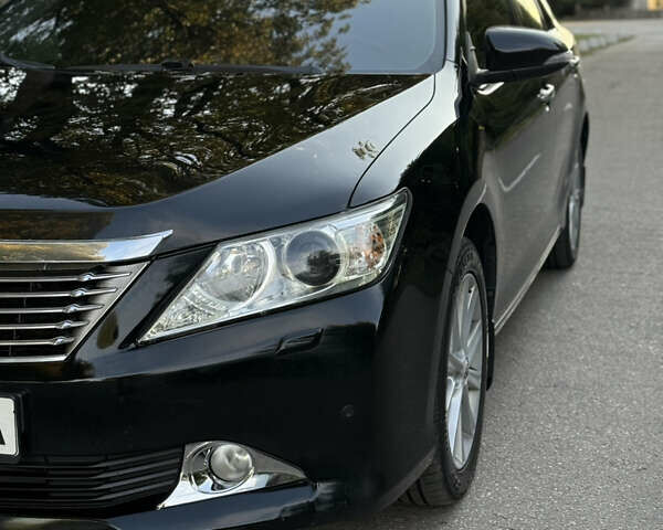 Черный Тойота Камри, объемом двигателя 2.5 л и пробегом 136 тыс. км за 14300 $, фото 3 на Automoto.ua