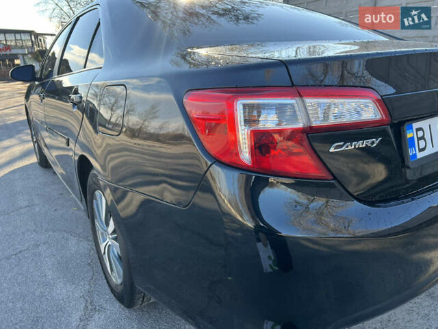 Чорний Тойота Камрі, об'ємом двигуна 2.5 л та пробігом 155 тис. км за 12000 $, фото 16 на Automoto.ua