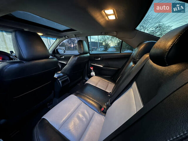 Черный Тойота Камри, объемом двигателя 2.5 л и пробегом 215 тыс. км за 11950 $, фото 28 на Automoto.ua