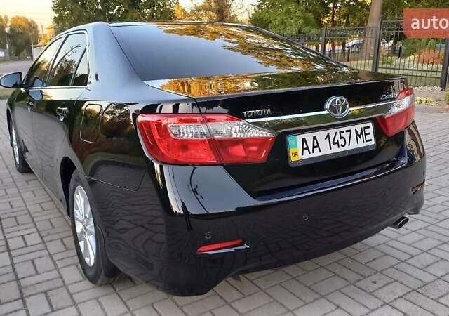 Черный Тойота Камри, объемом двигателя 2.49 л и пробегом 188 тыс. км за 12700 $, фото 1 на Automoto.ua