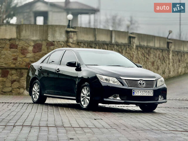 Чорний Тойота Камрі, об'ємом двигуна 2.5 л та пробігом 251 тис. км за 10999 $, фото 2 на Automoto.ua