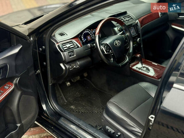 Чорний Тойота Камрі, об'ємом двигуна 2.5 л та пробігом 251 тис. км за 10999 $, фото 38 на Automoto.ua