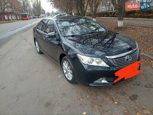 Черный Тойота Камри, объемом двигателя 2.5 л и пробегом 185 тыс. км за 13200 $, фото 7 на Automoto.ua