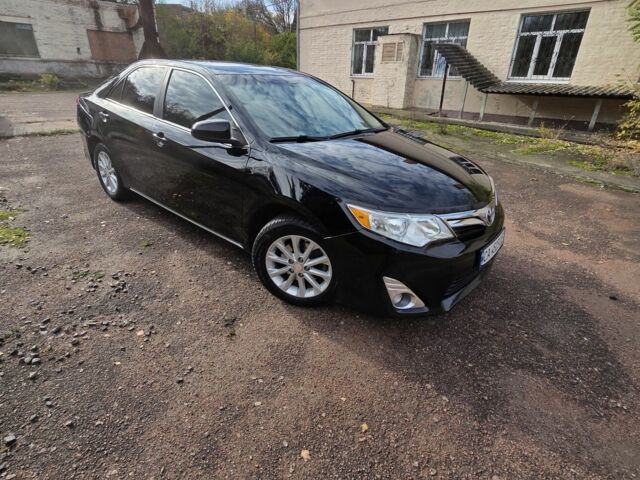 Чорний Тойота Камрі, об'ємом двигуна 2.5 л та пробігом 230 тис. км за 9999 $, фото 1 на Automoto.ua