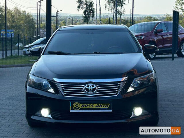 Черный Тойота Камри, объемом двигателя 2.5 л и пробегом 211 тыс. км за 12700 $, фото 1 на Automoto.ua
