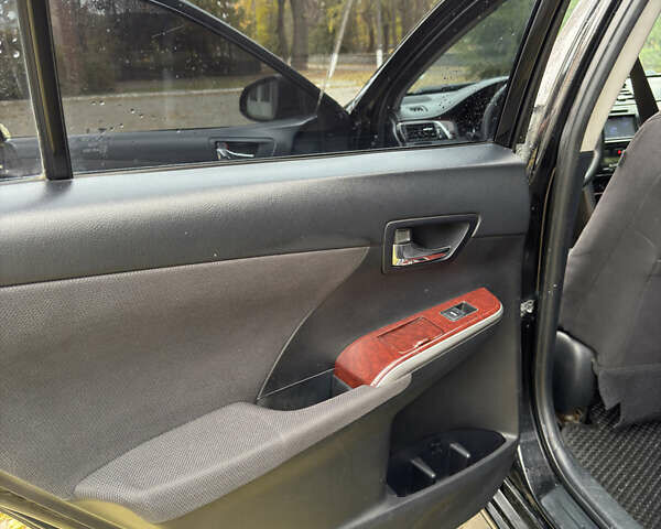 Черный Тойота Камри, объемом двигателя 2.36 л и пробегом 231 тыс. км за 9900 $, фото 13 на Automoto.ua