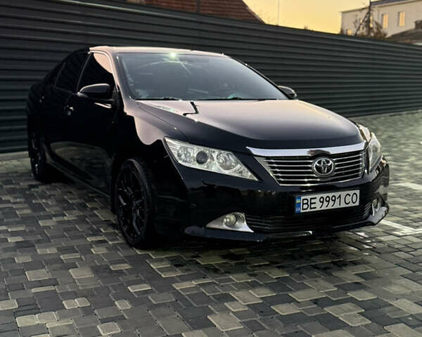 Чорний Тойота Камрі, об'ємом двигуна 2.5 л та пробігом 216 тис. км за 13000 $, фото 1 на Automoto.ua