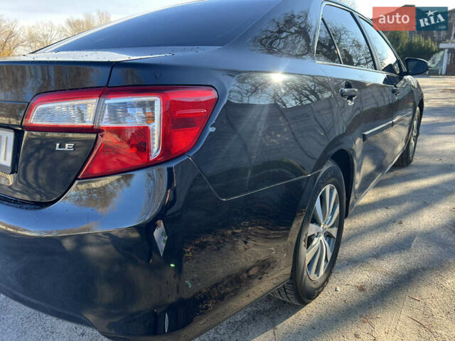 Чорний Тойота Камрі, об'ємом двигуна 2.5 л та пробігом 155 тис. км за 12000 $, фото 17 на Automoto.ua